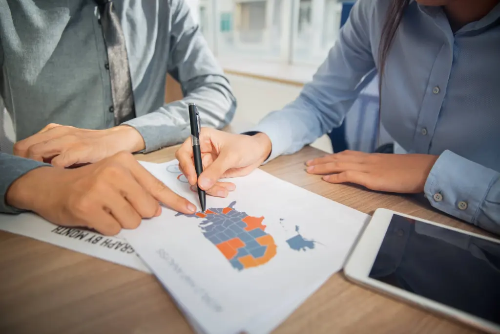 business team studying usa marketing statistics (1)