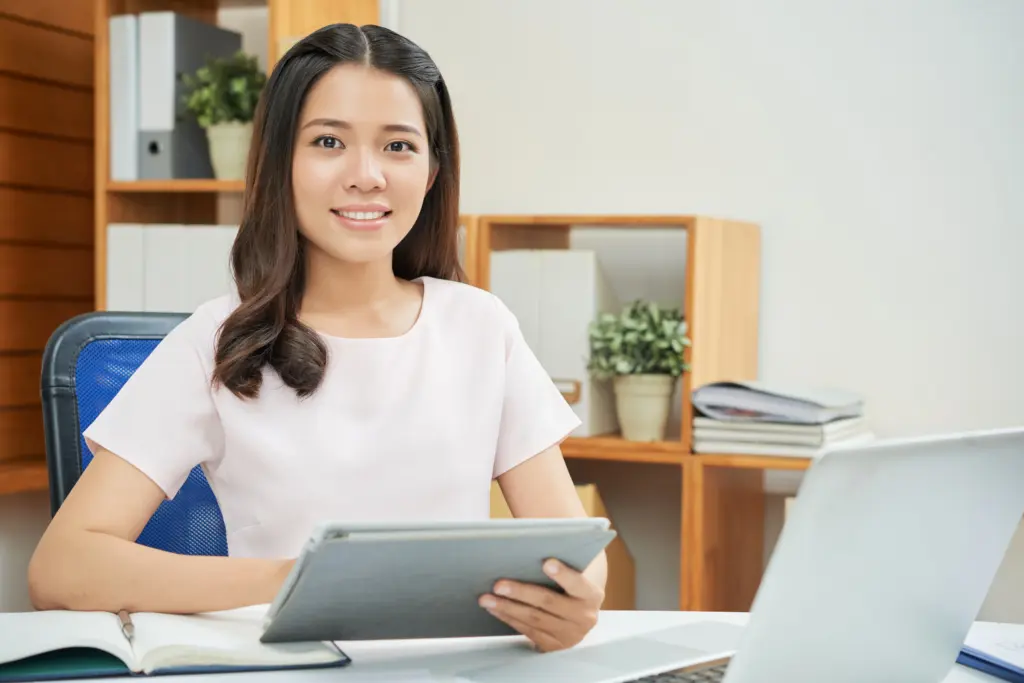 confident modern woman with tablet office (1)