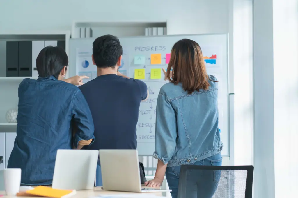 creative agency business brain storm meeting presentation team discussing roadmap product launch presentation planning strategy new business development (1)