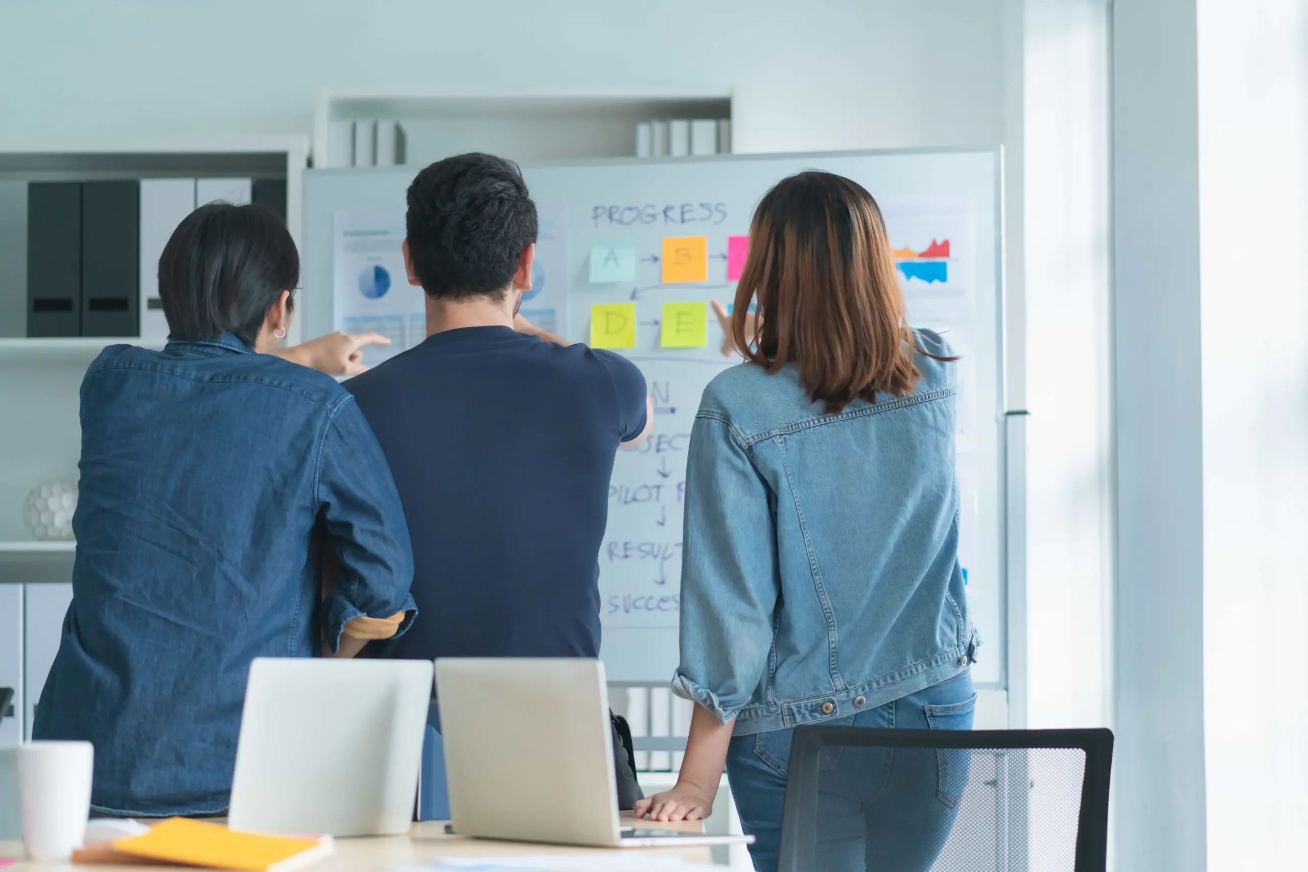 creative agency business brain storm meeting presentation team discussing roadmap product launch presentation planning strategy new business development (1)