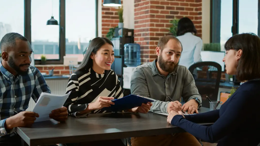 diverse team hr workers interviewing candidate job offer attending employment recruitment meeting office business people talking jobless woman about career opportunity (1)