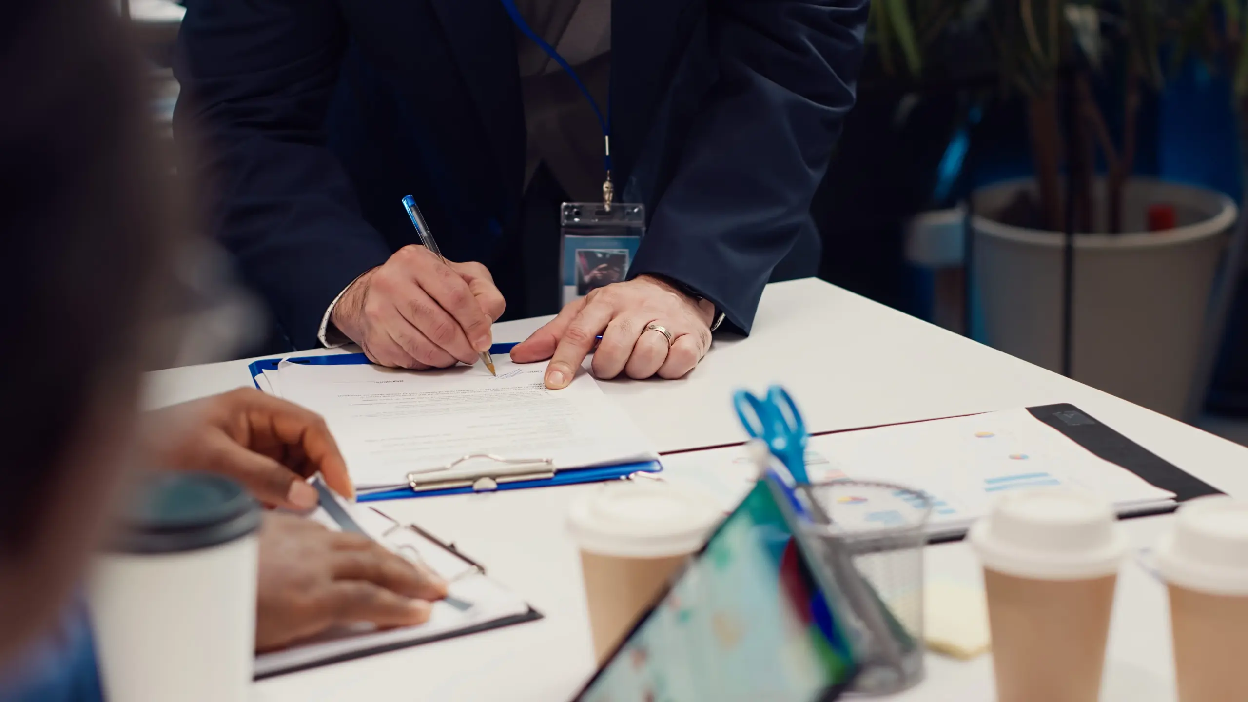 entrepreneurs signing new partnership contract their firms (1)