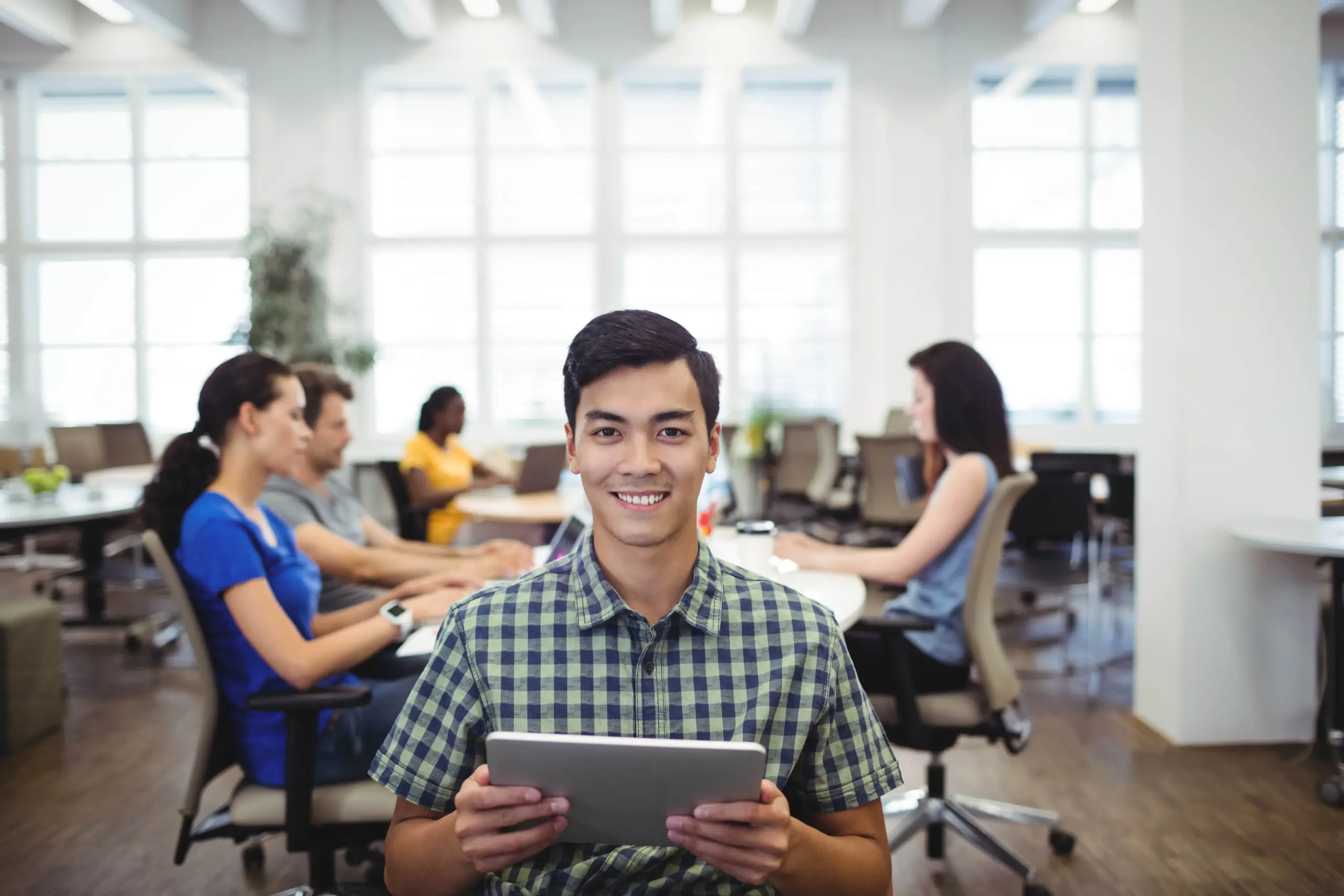 portrait man holding digital tablet (1)