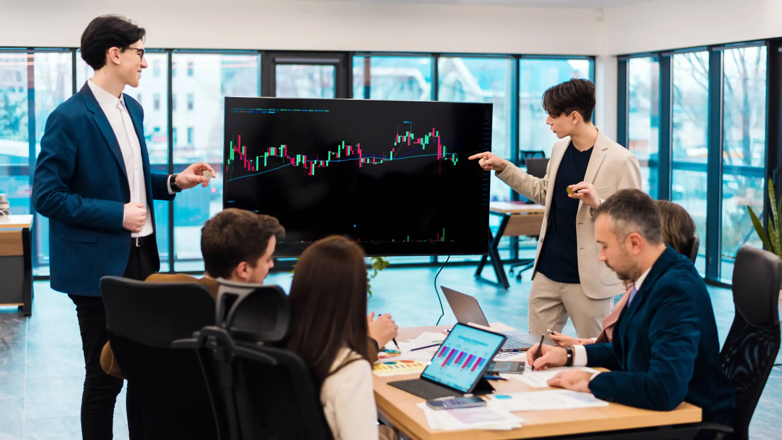 two young worker leading business meeting about cryptocurrencies office (1)