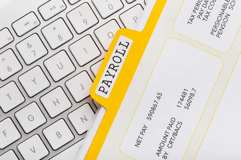 top view payroll concept with keyboard (1)
